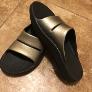 Oofos black and gold
